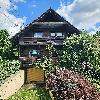 Holzblockhaus im Grünen mit Schwimmbad und großer Terrasse – Tiefgarage – Photovoltaik – E-Ladestation - Provisionsfrei